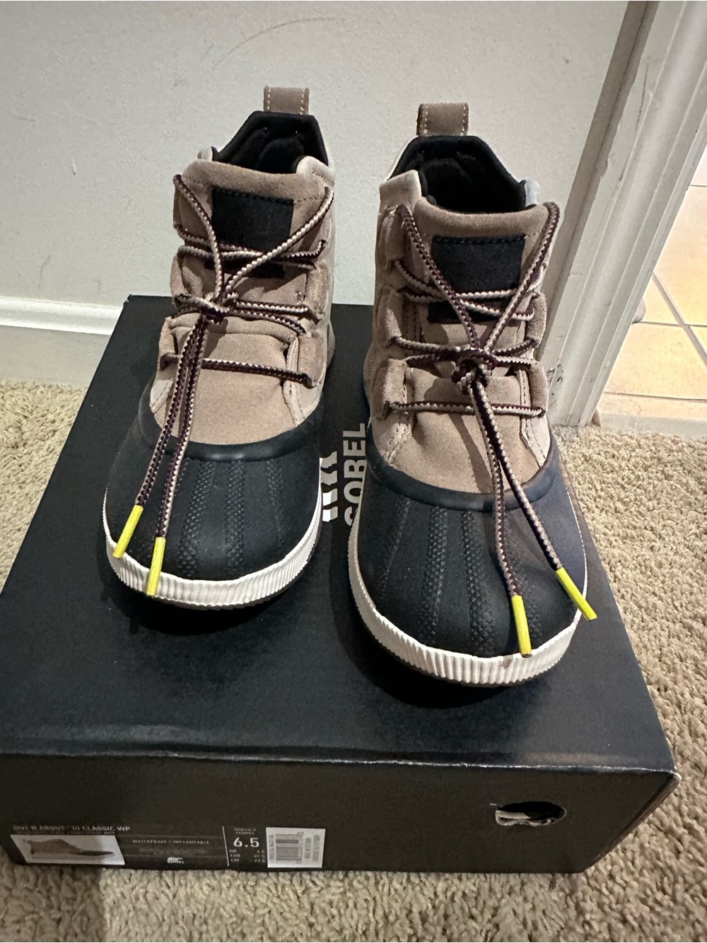 Sorel Women’s Waterproof Out N About Duck Boots in Black and Taupe